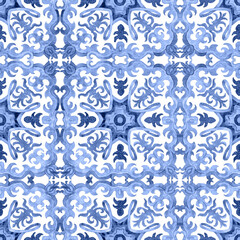Watercolor seamless pattern of hand drawn blue geometrical and floral ornate tiles on a white background