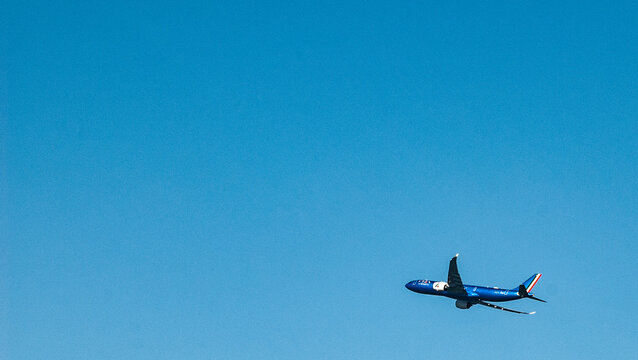 LIDO DI OSTIA &ndash; ROME, plane on landing to the near Fiumicino airport over the sky of Ostia, Ostia Lido, Rome, Italy
