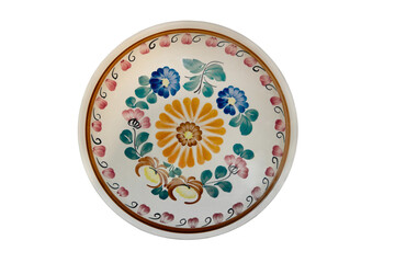 Painted ceramic plate isolated on white background