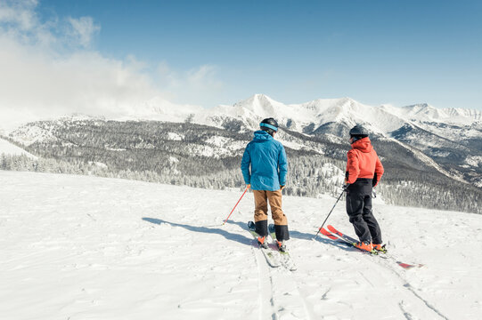 A couple of friends skiing Monarch mountain resort