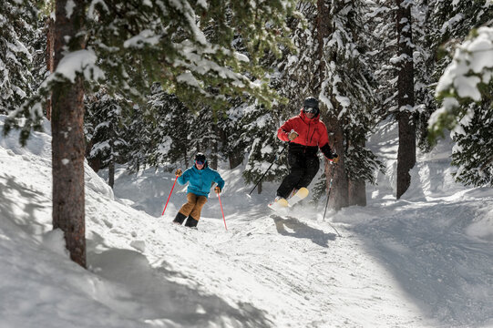 A couple of friends skiing Monarch mountain resort