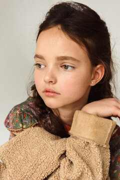 Portrait of a beautiful 7 years old girl. Close-up, studio.
