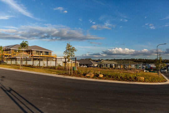 new housing estate and roads near Brisbane under a blue sky