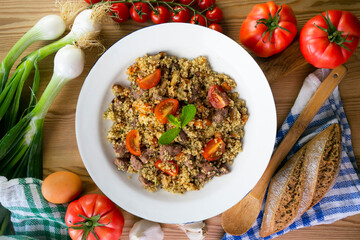 Couscous with beef and vegetables. Top view table with  decoration.