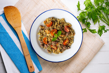 Couscous with beef and vegetables. Top view table with  decoration.