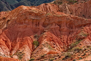 Northern Kyrgyzstan. The unusual texture of red-yellow clay rocks in the famous Skazka Canyon, off...