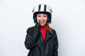 Young Russian girl with a motorcycle helmet isolated on white background with surprise and shocked facial expression