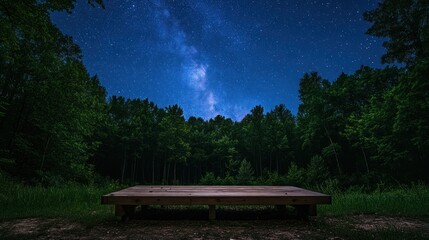 Obraz premium wooden terrace or desk with copy space for display of product or object presentation with milky way galaxy