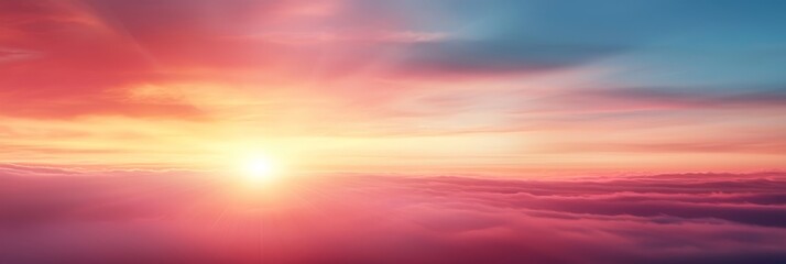 Obraz premium The sun sets, painting the cloud-studded sky with pink, blue, and yellow hues