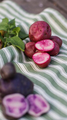 organic potatoes close up on striped tablecloth selective focus