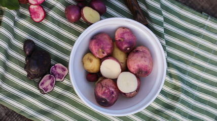 potatoes cut into large pieces in a bowl for cooking delicious food