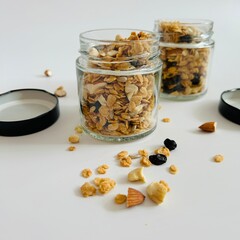 Sweet Homemade Granola in Glass Jar with Nuts