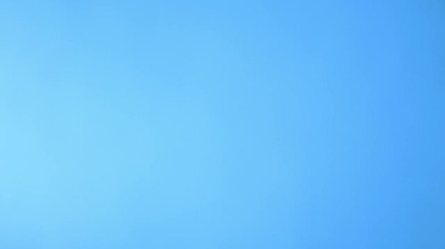 Blue background. Light blue winterr color backdrop. Pastel tint. Luxury mockup design. Cold wallpaper. Copy space. Soft light gradient. Fresh colour. No people. Empty osb wall. 4k footage