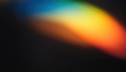 Abstract Vibrant Light Spectrum with Bokeh Effect Against a Dark Background. Multicolored Hues of Red, Yellow, Green, and Blue Blur in Soft Gradients Creating a Dreamlike and Atmospheric Composition