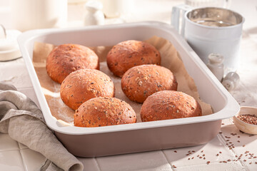 Homemade and tasty flax seed rolls made of sourdough.