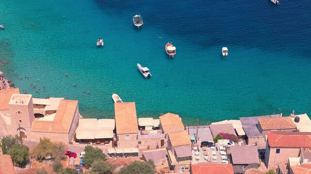 Greece Peloponnese Region Limeni Town Unique Blue Waters People Swimming in the Sea in Summer Holiday Concept and Boats