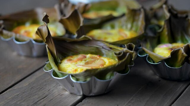 delicious homemade bibingka; Filipino Coconut rice cake with salted egg