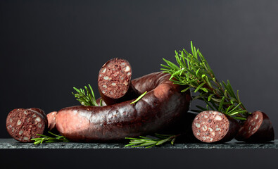 Black pudding or blood sausage with rosemary.