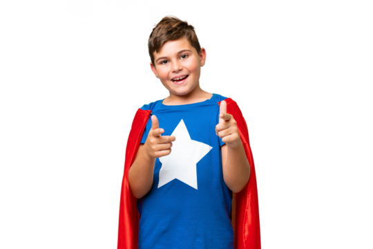 Super Hero caucasian kid over isolated chroma key background pointing to the front and smiling