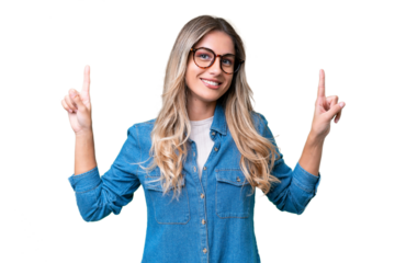 Young Uruguayan woman over isolated background pointing up a great idea