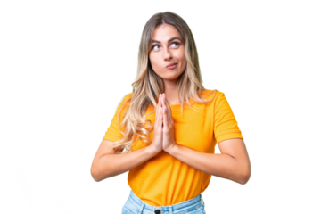 Young Uruguayan woman over isolated background scheming something