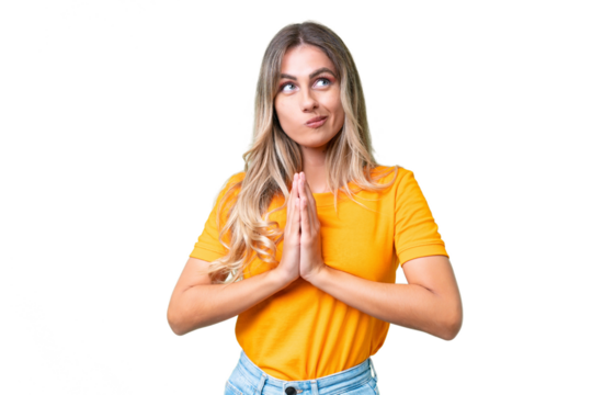 Young Uruguayan woman over isolated background scheming something