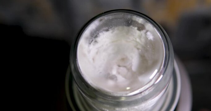grind sugar into powdered sugar powdered sugar to make from sugar with a blender. High quality 4k footage