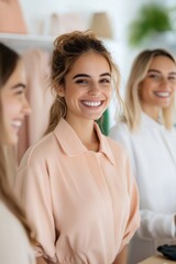 Obraz premium A group of friendly sales girls in a vibrant clothing boutique