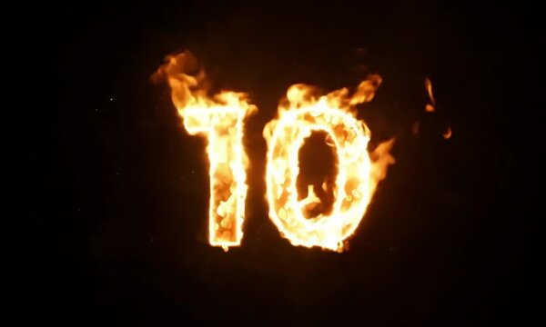 Number 10 formed by flames isolated on a dark background.