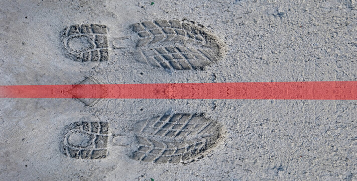 Concept image . Crossing or straddling the line,.  Or sitting on the fence 