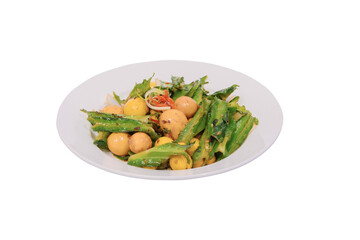 A plate of stir-fried eggs with winged beans, showcasing vibrant green pods and yellow egg pieces, offering a visual representation of a nutritious meal.