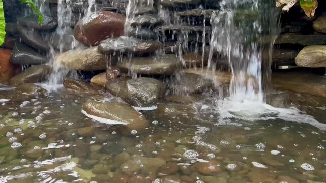 custom made mini waterfall with the sound of water falling from a cliff