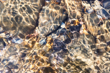 Close-Up of colorful pebbles on a beach shore