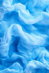 Obraz premium A close-up of a blue and white textured wallpaper with wavy lines