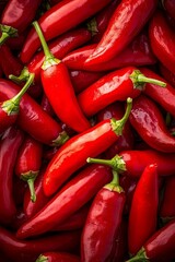  A heap of red-hot peppers atop another, both piles aligned side by side