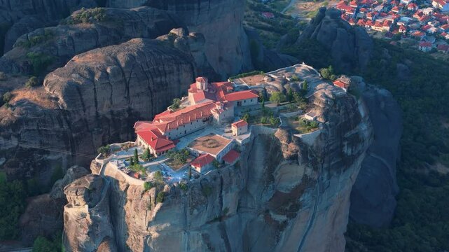 Greece Meteora region unique mountain formations and monasteries on it 4k videos taken with drone at sunrise