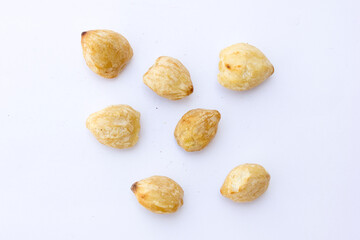 Candlenut, scientifically known as Aleurites moluccanus, is a tropical tree native to the Indo-Malaysia region. Its seeds are used for various culinary and medicinal purposes, but they must be process