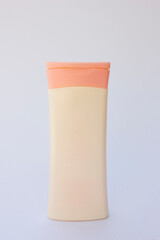 A pink plastic bottle. This bottle is a body lotion bottle. 