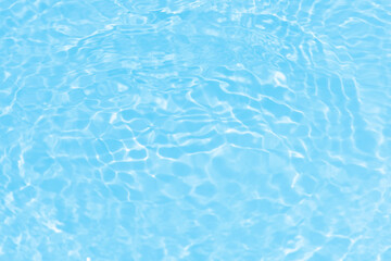 Blue water with ripples on the surface. Defocus blurred transparent blue colored clear calm water...