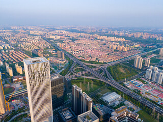 Aerial view of Shanghai Downtown skyline, highway roads or street . Financial district and business area in smart urban city. Skyscraper and high-rise buildings in sunny day