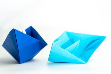 Paper colored boat isolated on white background. origami crafts. transport concept. origami.