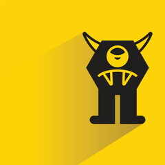 monster icon with shadow on yellow background