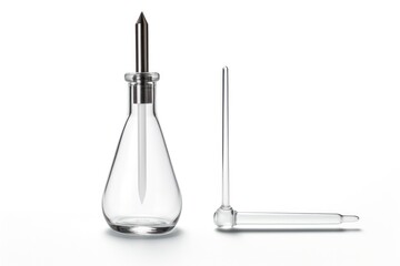 A delicate glass ampoule with a tapered tip and a sealed glass vial