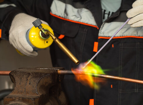 soldering copper pipes with a gas torch with mapp gas