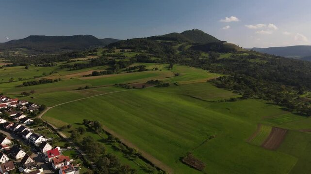A flight above Dettingen Teck towards the Castle Teck which is located high above the mountain 