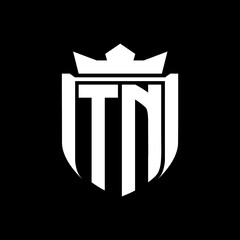 TN Letter logo shield shape inside shield badge crown on black background template design