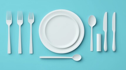 Biodegradable tableware like plates and cutlery arranged in a neat 3D layout