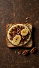 Handmade banana toast against a brown brick backdrop with pecans.