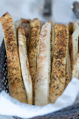 Close-Up of Bread Sticks with Sesame Seeds in a Basket