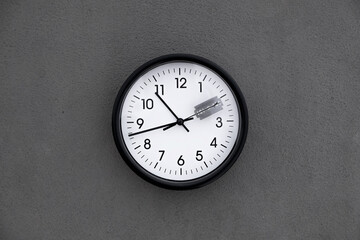 photo of a clock with a razor attached to the seconds